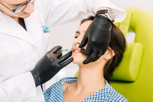 Plastic surgeon, professional doctor using lip injection and lifting techniques for anti aging treatments